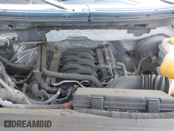 2014 Ford F-150 XL with VIN 1FTFW1CF2EKF75517, listed as a IAAI auction lot 40534480 with 121,035 mi miles. Bid and sale history available at carsss.com. Image 10.