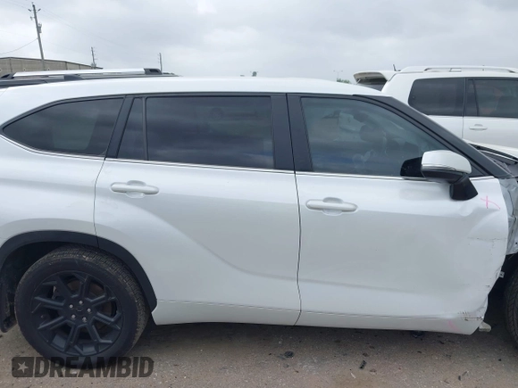 2023 Toyota Highlander L with VIN 5TDKDRAH9PS039652, listed as a IAAI auction lot 41948320 with 127,310 mi miles and . Bid and sale history available at DreamBid. Image 13.