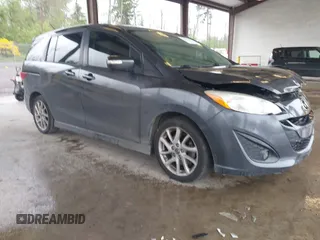 2013 Mazda 5 Touring z VIN JM1CW2CL5D0151662, wystawiony jako IAAI lot #42280056 z przebiegiem 158 013 mil mil oraz . Historia ofert i sprzedaży dostępna na DreamBid. Obrazek 1.