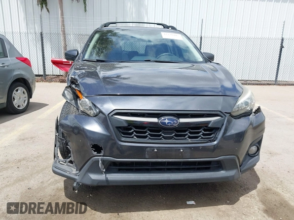 2018 Subaru Crosstrek Premium z VIN JF2GTACC9JH215303, wystawiony jako IAAI lot #42228185 z przebiegiem 71 170 mil mil oraz . Historia ofert i sprzedaży dostępna na DreamBid. Obrazek 12.