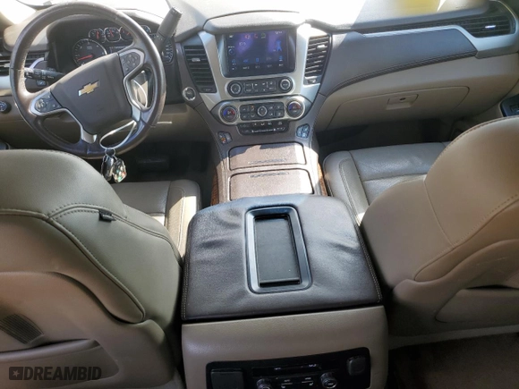 2015 Chevrolet Tahoe LTZ with VIN 1GNSCCKCXFR102314, listed as a Copart auction lot 48479825 with 218,901 mi miles and Salvage Title. Bid and sale history available at carsss.com. Image 8.