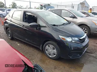 2019 Honda Fit LX z VIN 3HGGK5G47KM716488, wystawiony jako IAAI lot #42665419 z przebiegiem 65 112 mil mil oraz . Historia ofert i sprzedaży dostępna na DreamBid. Obrazek 1.