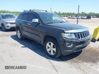 2014 Jeep Grand Cherokee Laredo with VIN 1C4RJEAG9EC157383, listed as a IAAI auction lot 42074411 with 213,566 mi miles and . Bid and sale history available at DreamBid. Image 1.