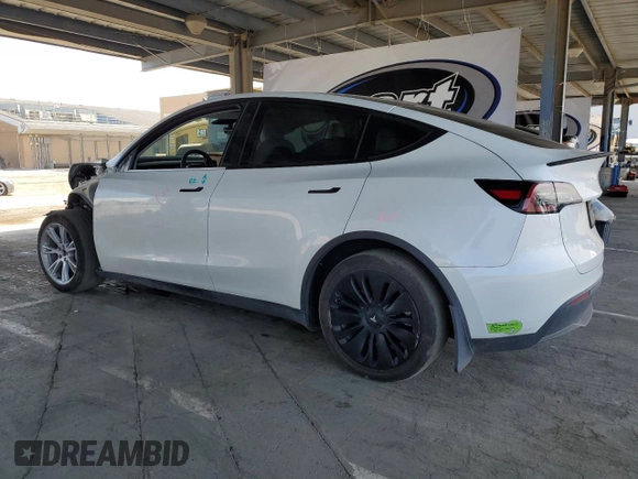 2023 Tesla Model Y Long Range with VIN 7SAYGDEE8PF620703, listed as a Copart auction lot 54655105 with 29,538 mi miles and Salvage Title. Bid and sale history available at DreamBid. Image 2.