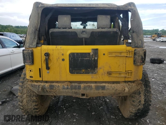 2009 Jeep Wrangler X with VIN 1J4FA24119L754391, listed as a Copart auction lot 56067805 with 118,117 mi miles and Salvage title. Bid and sale history available at DreamBid. Image 6.