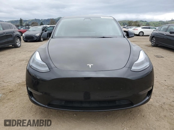 2023 Tesla Model Y Long Range with VIN 7SAYGDEE1PF923998, listed as a Copart auction lot 48954205 with 21,525 mi miles and Salvage Title. Bid and sale history available at DreamBid. Image 5.