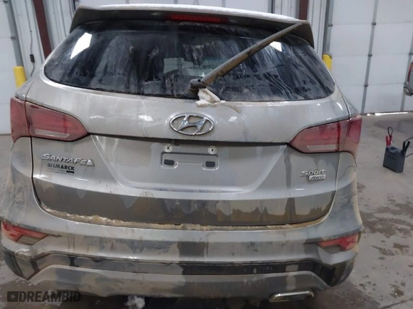 2018 Hyundai Santa Fe Sport 2.4L with VIN 5NMZUDLBXJH075211, listed as a IAAI auction lot 41497651 with 57,420 mi miles. Bid and sale history available at carsss.com. Image 15.