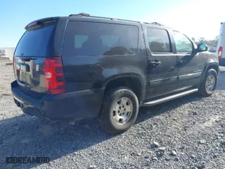 2013 Chevrolet Suburban LT with VIN 1GNSCJE03DR237220, listed as a IAAI auction lot 41904698 with 372,811 mi miles. Bid and sale history available at carsss.com. Image 4.