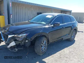 2018 Mazda CX-9 Sport with VIN JM3TCABY8J0223750, listed as a IAAI auction lot 42155429 with 133,543 mi miles and . Bid and sale history available at DreamBid. Image 2.