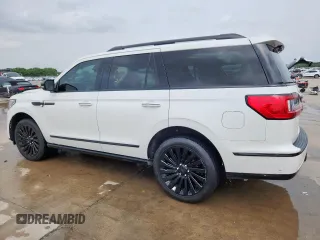 2020 Lincoln Navigator Reserve with VIN 5LMJJ2LTXLEL01023, listed as a Copart auction lot 57403185 with 116,215 mi miles and Salvage title. Bid and sale history available at DreamBid. Image 2.