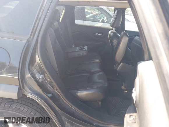 2015 Jeep Cherokee Trailhawk with VIN 1C4PJMBS4FW556822, listed as a IAAI auction lot 42412874 with 129,865 mi miles and . Bid and sale history available at DreamBid. Image 8.