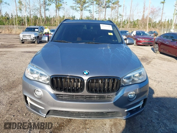 2016 BMW X5 xDrive40e with VIN 5UXKT0C57G0S75476, listed as a IAAI auction lot 41642249 with 105,489 mi miles and . Bid and sale history available at DreamBid. Image 13.