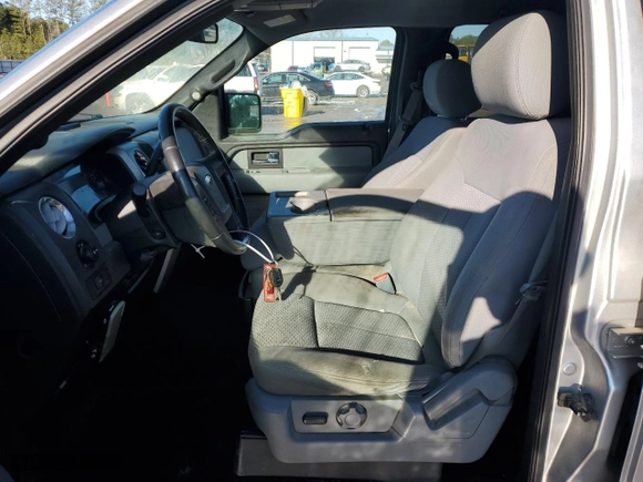 2013 Ford F-150 XL with VIN 1FTFW1CF1DFD63215, listed as a Copart auction lot 42959175 with 174,448 mi miles and Salvage Title. Bid and sale history available at carsss.com. Image 7.