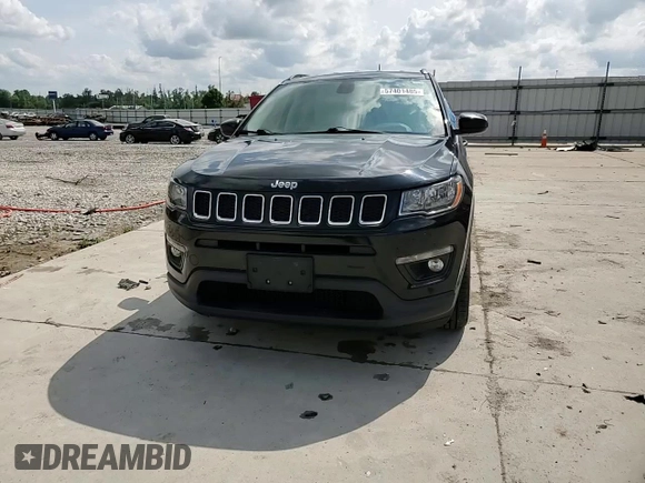 2017 Jeep Compass Latitude with VIN 3C4NJCBB0HT611440, listed as a Copart auction lot 57401485 with 128,319 mi miles and Salvage title. Bid and sale history available at DreamBid. Image 14.