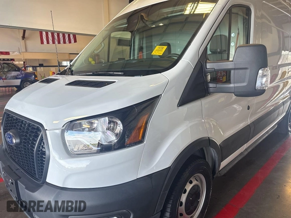 2023 Ford Transit Cargo with VIN 1FTBR1X86PKC09421, listed as a IAAI auction lot 42843981 with 10,233 mi miles and . Bid and sale history available at DreamBid. Image 11.