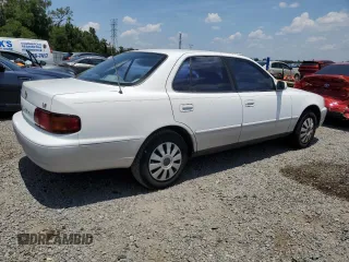 1995 Toyota Camry LE with VIN 4T1SK12E4SU878765, listed as a Copart auction lot 57761385 with 181,674 mi miles and Clean title. Bid and sale history available at DreamBid. Image 3.