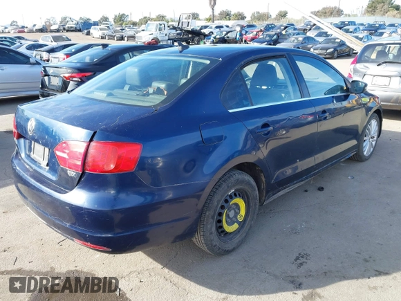 2014 Volkswagen Jetta TDI w/Premium with VIN 3VW3L7AJ7EM367323, listed as a IAAI auction lot 41419079 with 166,511 mi miles and . Bid and sale history available at DreamBid. Image 4.