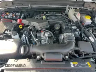 2023 Jeep Wrangler Willys with VIN 1C4HJXDG2PW671483, listed as a Copart auction lot 46990395 with 15,087 mi miles and Salvage title. Bid and sale history available at DreamBid. Image 14.