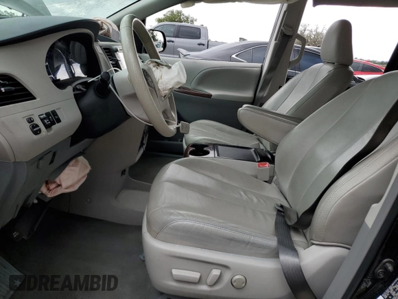 2012 Toyota Sienna XLE AAS with VIN 5TDYK3DC1CS279236, listed as a Copart auction lot 63329165 with 143,937 mi miles and Salvage title. Bid and sale history available at DreamBid. Image 7.