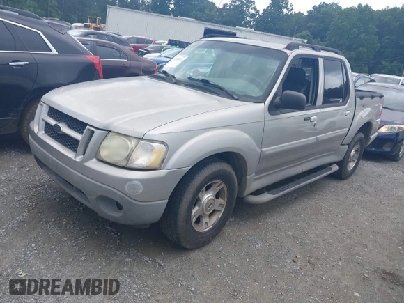 2003 Ford Explorer Sport Trac XLS z VIN 1FMZU67E63UC48939, wystawiony jako IAAI lot #42526151 z przebiegiem 221 402 mil mil oraz . Historia ofert i sprzedaży dostępna na DreamBid. Obrazek 2.