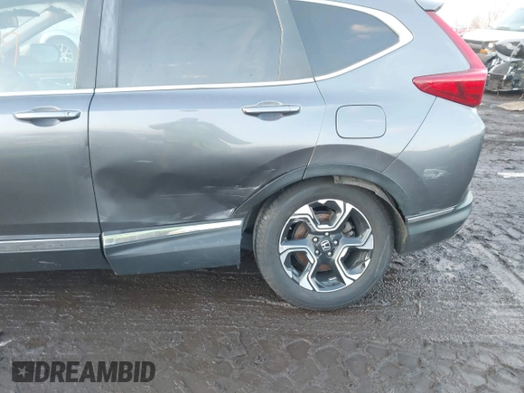 2017 Honda CR-V Touring with VIN 2HKRW2H94HH617081, listed as a IAAI auction lot 41294254 with 145,140 mi miles. Bid and sale history available at carsss.com. Image 6.