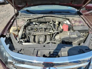 2012 Ford Fusion SE z VIN 3FAHP0HA7CR387524, wystawiony jako Copart lot #62083235 z przebiegiem 104 698 mil mil oraz Szkoda całkowita • Salvage title. Historia ofert i sprzedaży dostępna na DreamBid. Obrazek 11.