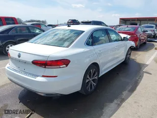 2022 Volkswagen Passat 2.0T SE with VIN 1VWSA7A33NC005929, listed as a IAAI auction lot 41877352 with 45,383 mi miles. Bid and sale history available at carsss.com. Image 4.