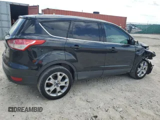 2013 Ford Escape SEL with VIN 1FMCU9H99DUD79003, listed as a Copart auction lot 51126005 with 104,151 mi miles and Clean Title. Bid and sale history available at DreamBid. Image 3.