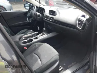 2014 Mazda 3 i Touring with VIN JM1BM1V72E1119890, listed as a IAAI auction lot 42531252 with 124,398 mi miles and . Bid and sale history available at DreamBid. Image 5.