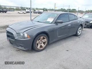 2014 Dodge Charger Police z VIN 2C3CDXAT9EH191184, wystawiony jako IAAI lot #42468882 z przebiegiem 202 790 mil mil oraz . Historia ofert i sprzedaży dostępna na DreamBid. Obrazek 2.