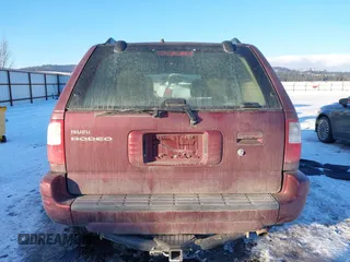 2002 Isuzu Rodeo z VIN 4S2DM58W124319936, wystawiony jako IAAI lot #41555285 z przebiegiem 143 035 mil mil oraz . Historia ofert i sprzedaży dostępna na DreamBid. Obrazek 16.