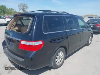 2007 Honda Odyssey Touring with VIN 5FNRL38847B092669, listed as a IAAI auction lot 42220313 with 177,789 mi miles and . Bid and sale history available at DreamBid. Image 4.