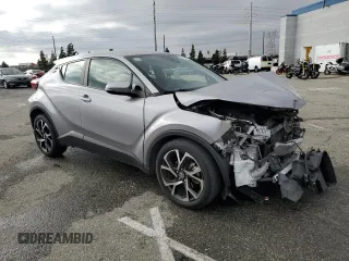 2019 Toyota C-HR XLE with VIN JTNKHMBX7K1045108, listed as a Copart auction lot 44070005 with 60,480 mi miles and Salvage Title. Bid and sale history available at DreamBid. Image 4.