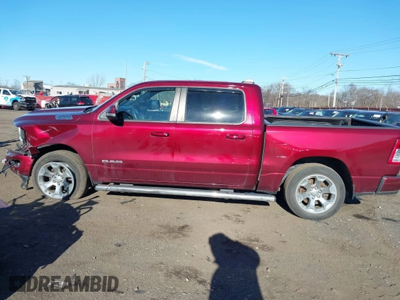 2019 Ram 1500 Big Horn/Lone Star with VIN 1C6SRFFT2KN647936, listed as a IAAI auction lot 41294403 with 123,834 mi miles. Bid and sale history available at carsss.com. Image 14.