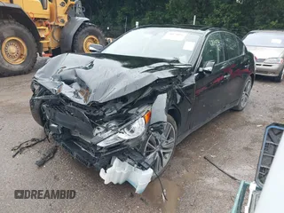 2014 Infiniti Q50 Premium with VIN JN1BV7AR9EM685022, listed as a IAAI auction lot 39874056 with 95,980 mi miles and . Bid and sale history available at DreamBid. Image 2.