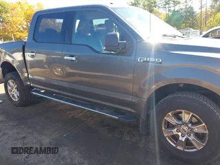2015 Ford F-150 XLT with VIN 1FTEW1EF7FFB65198, listed as a IAAI auction lot 40509417 with 119,649 mi miles and . Bid and sale history available at DreamBid. Image 14.