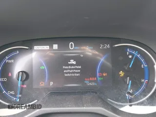 2024 Toyota RAV4 Hybrid LE with VIN 2T3UWRFV4RW219138, listed as a IAAI auction lot 42268211 with 12,423 mi miles and . Bid and sale history available at DreamBid. Image 7.