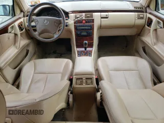 2001 Mercedes-Benz E-Class with VIN WDBJF65J01B389296, listed as a Copart auction lot 71933404 with 124,392 mi miles and Salvage Title. Bid and sale history available at carsss.com. Image 8.