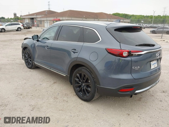 2023 Mazda CX-9 Grand Touring with VIN JM3TCBDY2P0636226, listed as a IAAI auction lot 42384360 with 161,352 mi miles and . Bid and sale history available at DreamBid. Image 3.