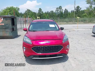 2020 Ford Escape Titanium z VIN 1FMCU9J92LUA39457, wystawiony jako IAAI lot #42222441 z przebiegiem 107 148 mil mil oraz . Historia ofert i sprzedaży dostępna na DreamBid. Obrazek 12.