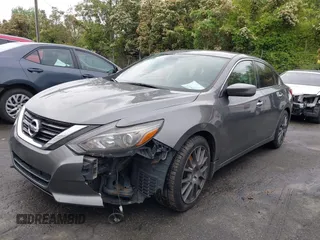 2016 Nissan Altima SR with VIN 1N4AL3AP1GC233201, listed as a IAAI auction lot 41974813 with 117,965 mi miles and . Bid and sale history available at carsss.com. Image 2.