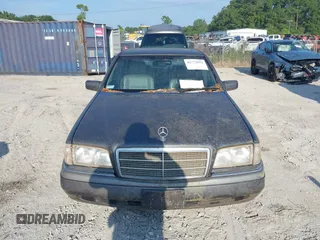 1997 Mercedes-Benz C with VIN WDBHA28E7VA496104, listed as a IAAI auction lot 42773052 with 258,692 mi miles and . Bid and sale history available at DreamBid. Image 6.