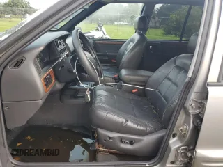 1998 Jeep Grand Cherokee Limited with VIN 1J4GZ78S2WC222768, listed as a Copart auction lot 73942154 with 0 mi miles and Salvage Title. Bid and sale history available at carsss.com. Image 7.