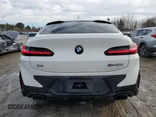 2024 BMW X4 M40i with VIN 5UX43DT00R9T40316, listed as a Copart auction lot 46582885 with 9,335 mi miles and Salvage Title. Bid and sale history available at carsss.com. Image 6.
