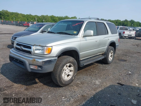 2000 Toyota 4Runner SR5 z VIN JT3HN86R7Y0290729, wystawiony jako IAAI lot #42409622 z przebiegiem 315 804 mil mil oraz . Historia ofert i sprzedaży dostępna na DreamBid. Obrazek 2.