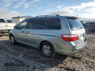 2007 Honda Odyssey EX-L with VIN 5FNRL38647B023186, listed as a Copart auction lot 87697035 with 190,884 mi miles and Salvage Title. Bid and sale history available at carsss.com. Image 2.