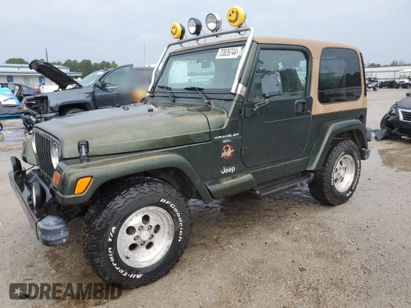 1997 Jeep Wrangler Sahara with VIN 1J4FY49SXVP453369, listed as a Copart auction lot 72826744 with 145,852 mi miles and Salvage Title. Bid and sale history available at carsss.com. Image 1.