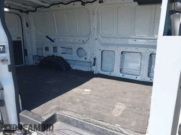 2020 Ford Transit Cargo with VIN 1FTBR1Y83LKA67103, listed as a IAAI auction lot 42408599 with 76,837 mi miles and . Bid and sale history available at DreamBid. Image 8.