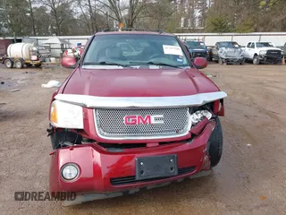 2007 GMC Envoy Denali with VIN 1GKES63M472162363, listed as a IAAI auction lot 41247540 with 237,356 mi miles. Bid and sale history available at carsss.com. Image 12.