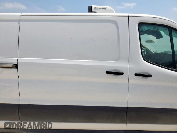 2023 Ford Transit Cargo с VIN 1FTBR1Y81PKB48106, выставлен на аукционе Copart как лот 57442685 с пробегом 11 889 миль миль и Списание • Salvage title. История ставок и продаж доступна на DreamBid. Изображение 11.